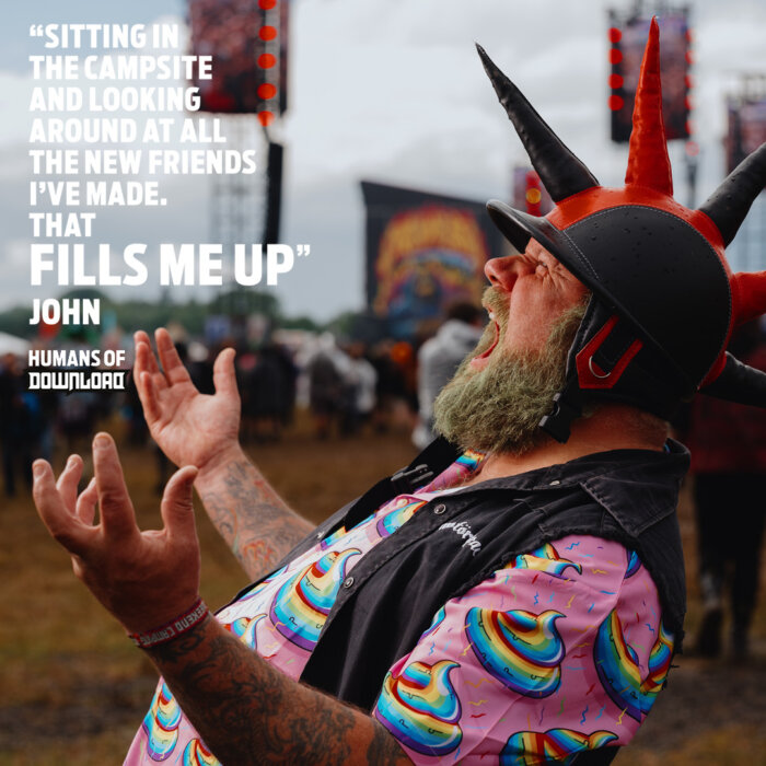 Download fan John striking a pose with caption text: 'Sitting in the campsite and looking around at all the new friends I've made. That fills me up.' - John - Humans of Download