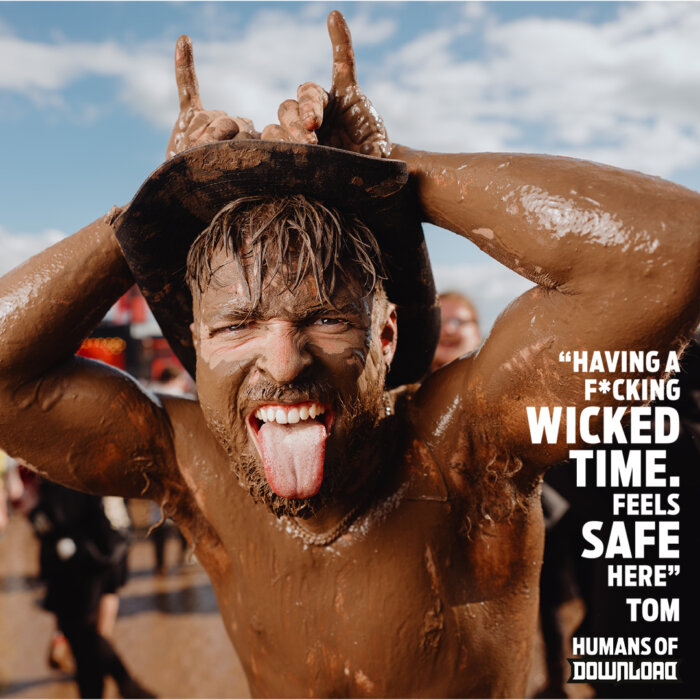 Download fan Tom striking a pose with caption text: 'Having a f*cking wicked time. Feels safe here.' - Tom - Humans of Download