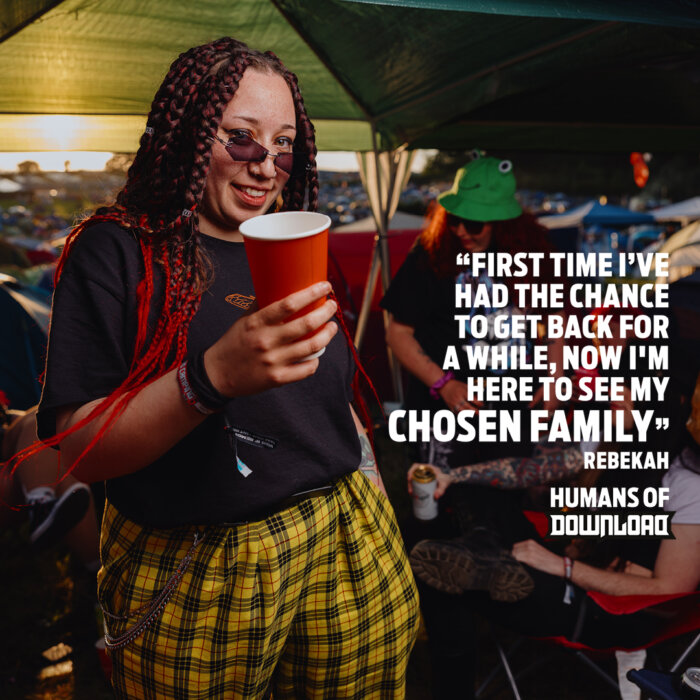 Download fan Rebekah striking a pose with caption text: 'First time I've had the chance to get back for a while, now I'm here to see my chosen family.' - Rebekah - Humans of Download
