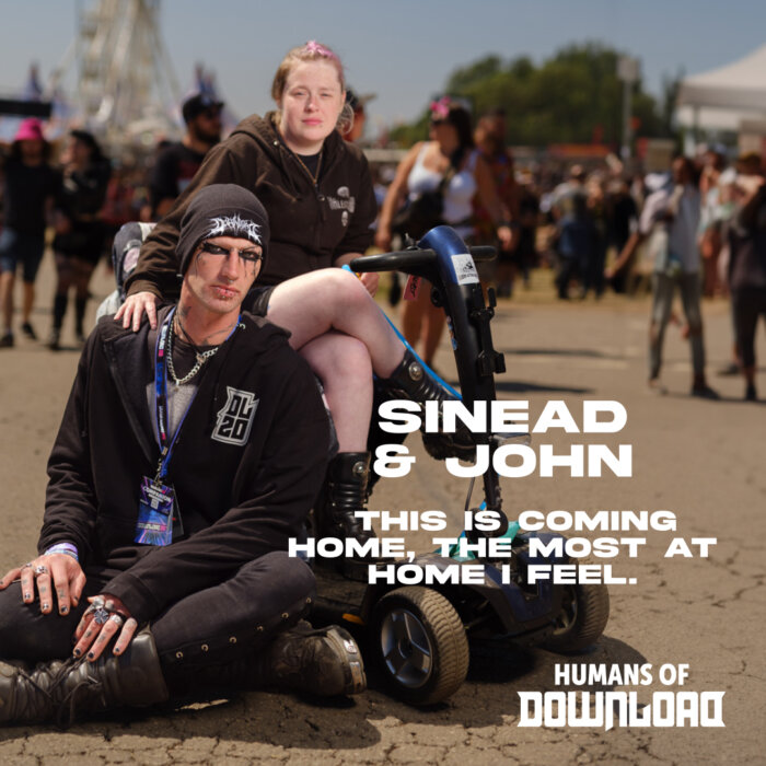 Download fans Sinead & John striking a pose with caption text: 'This is coming home, the most at home I feel.' - Sinead & John - Humans of Download