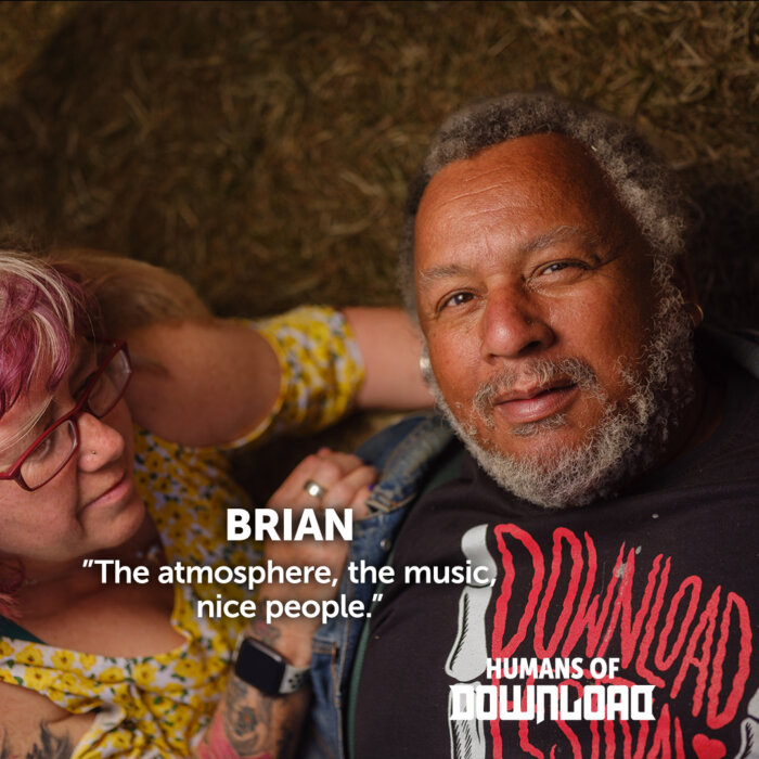Download fan Brian striking a pose with caption text: 'The atmosphere, the music, nice people.' - Brian - Humans of Download