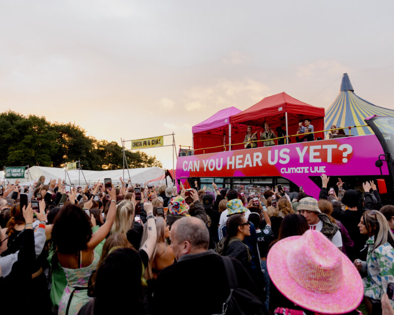 The Climate Live float in front of a group of downloaders