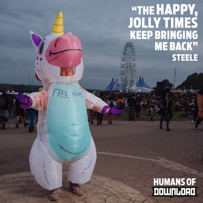 Download fan Steele striking a pose with caption text: 'The happy, jolly times keep bringing me back' - Steele - Humans of Download