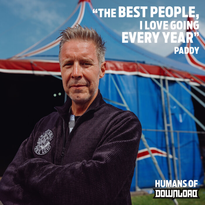 Paddy striking a pose with caption text: 'The best people, I love going every year' - Paddy - Humans of Download