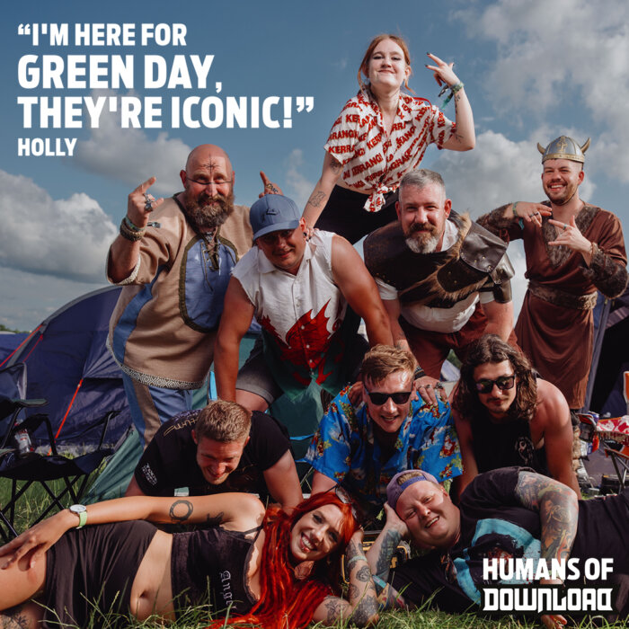 Download fan Holly striking a pose with caption text: 'I'm here for Green Day. They're iconic!' - Holly - Humans of Download