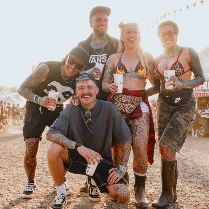 Five Download fans posing for a photo.