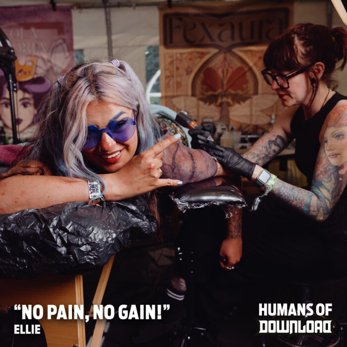 Download fan striking a pose with caption text: ‘No pain, no gain!’ - Ellie - Humans of Download