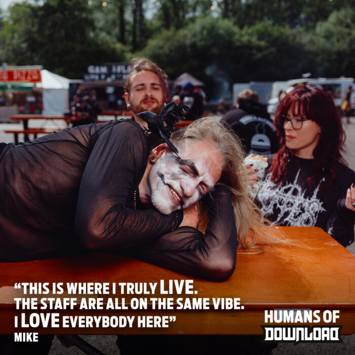 Download fan striking a pose with caption text: ‘This is where I truly live. The staff are all on the same vibe. I love everybody here.’ - Mike - Humans of Download