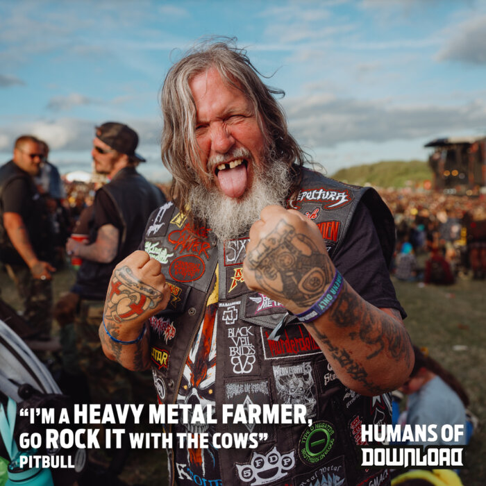 Download fan striking a pose with caption text: ‘I'm a heavy metal farmer, go rock it with the cows.’ - Pitbull - Humans of Download