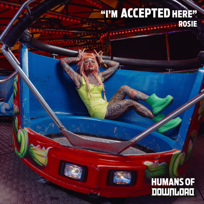 Download fan striking a pose with caption text: ‘I'm accepted here.’ - Rosie - Humans of Download
